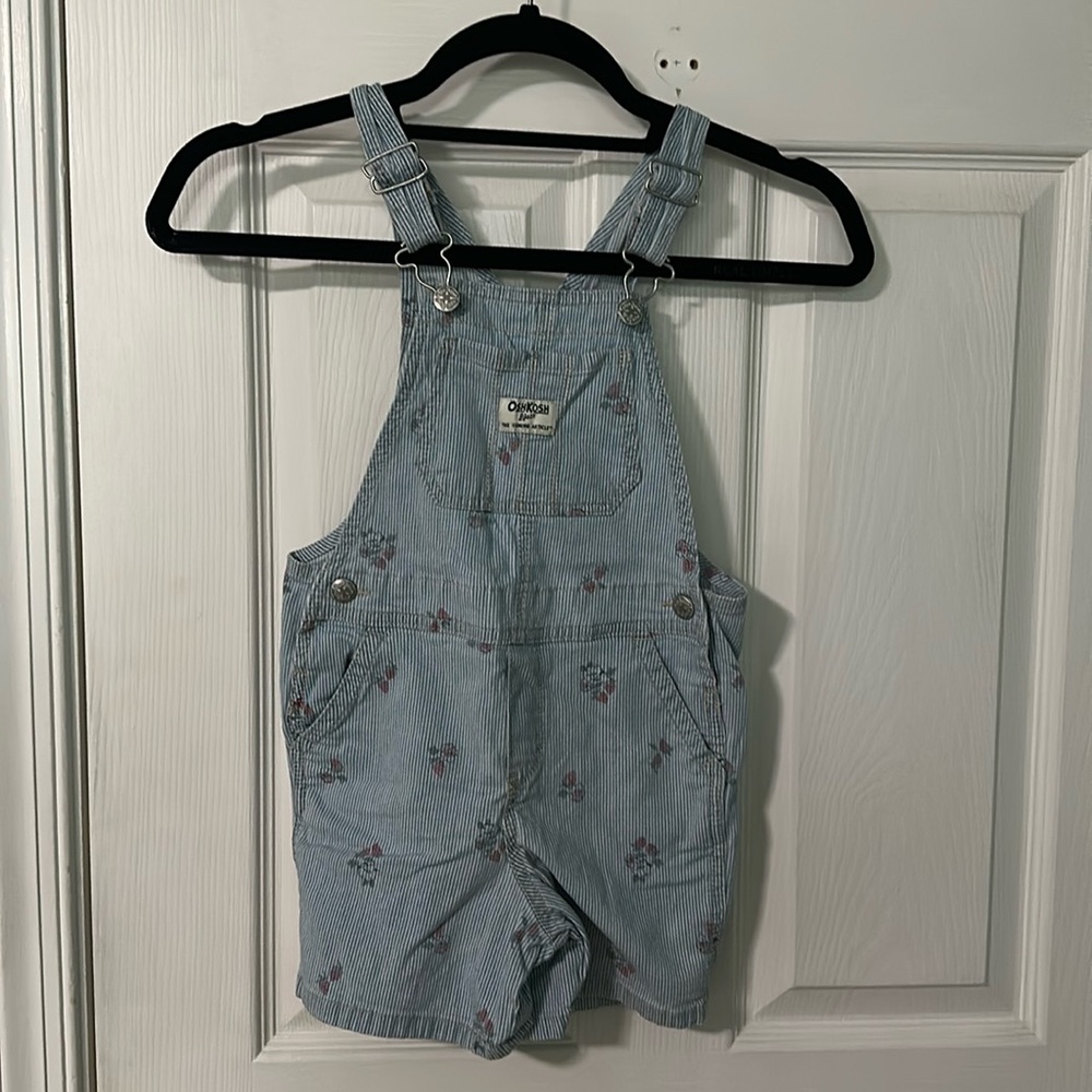 OshKosh Overall Shorts with pin strip details and small clusters of flowers